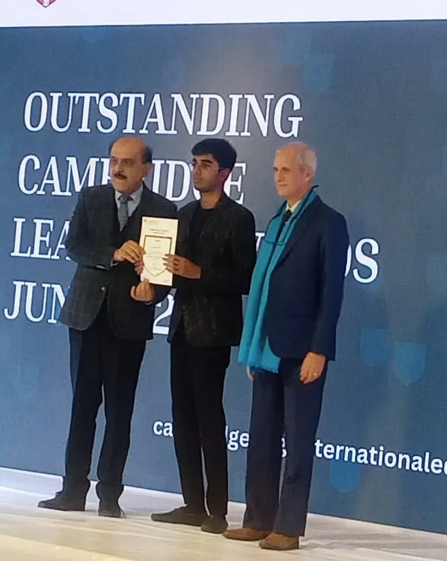 Student receiving award