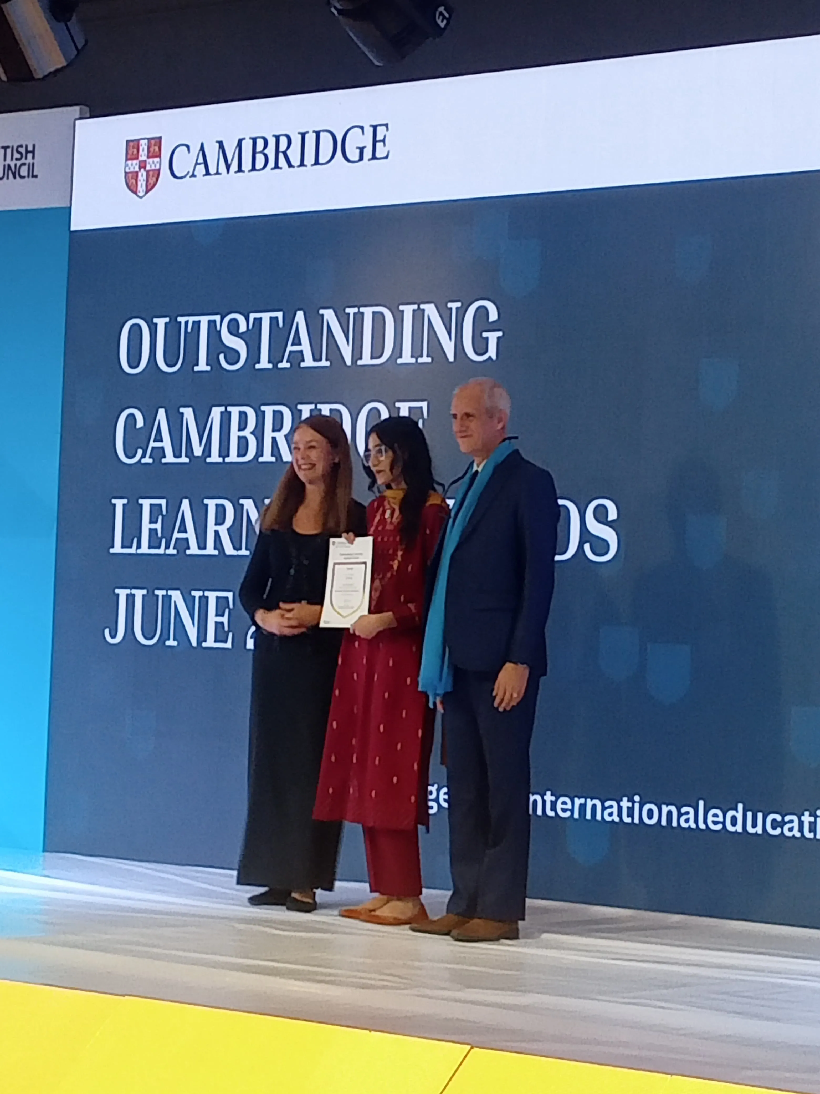 Irsa Farooq with certificate